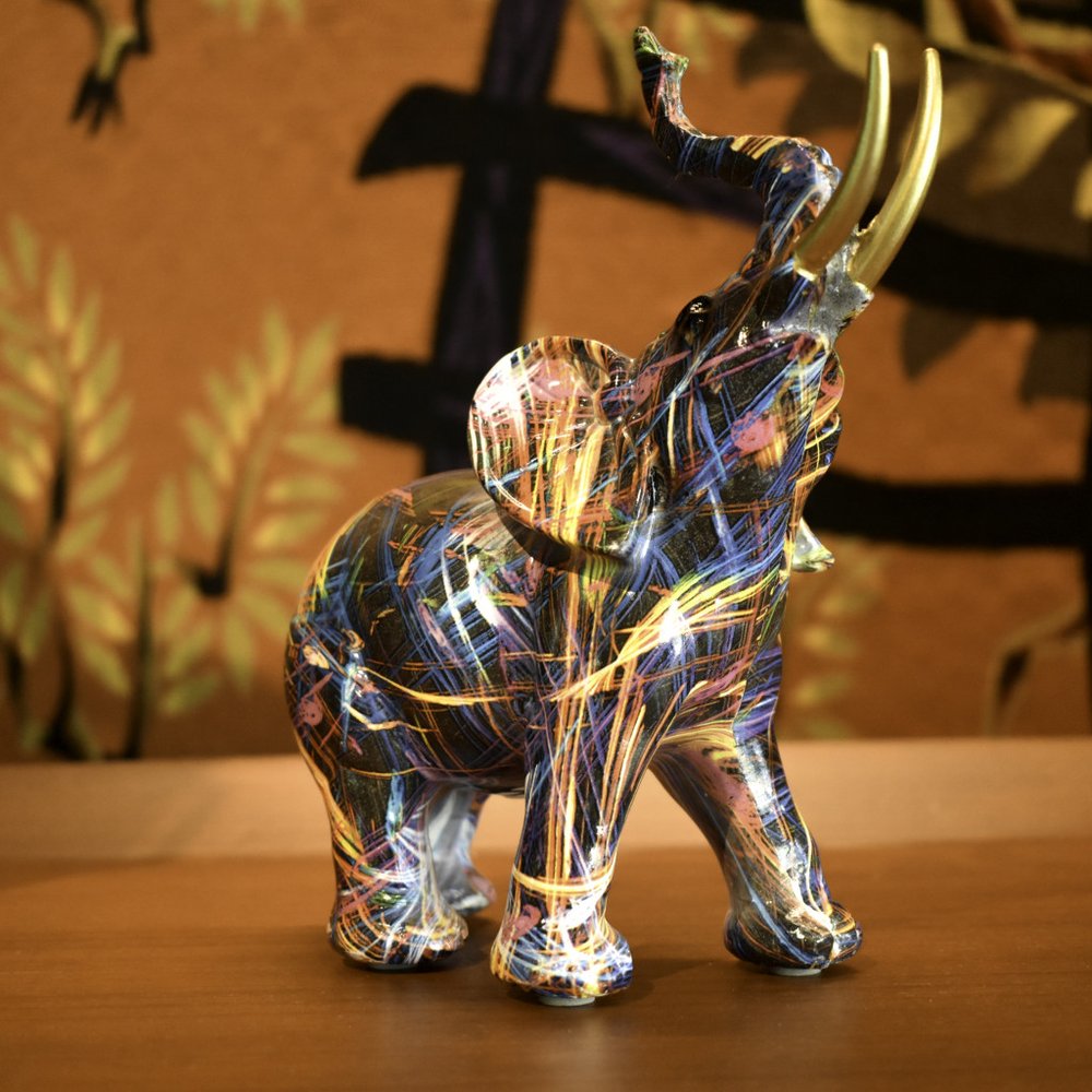 7" Blue Yellow And Pink Resin Elephant Tabletop Sculpture
