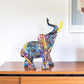 7" Blue Yellow And Pink Resin Elephant Tabletop Sculpture