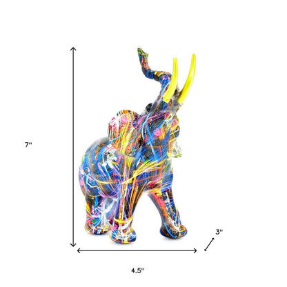 7" Blue Yellow And Pink Resin Elephant Tabletop Sculpture