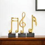 Set of Three Gold Resin Music Tabletop Sculpture