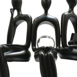 Set of Three Black Resin People Tabletop Sculpture