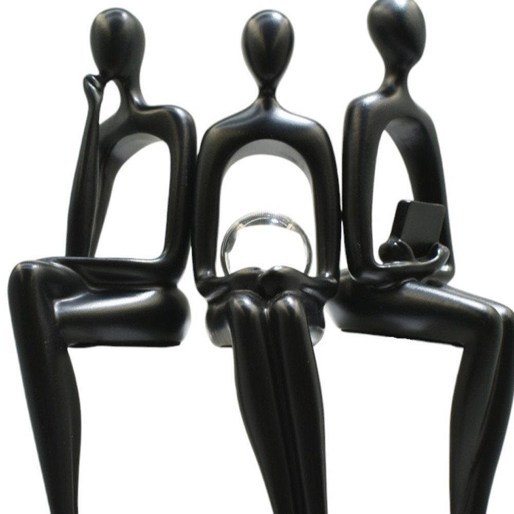 Set of Three Black Resin People Tabletop Sculpture