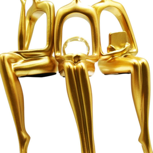 Set of Three Gold Resin People Tabletop Sculpture