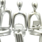 Set of Three Silver Resin People Tabletop Sculpture