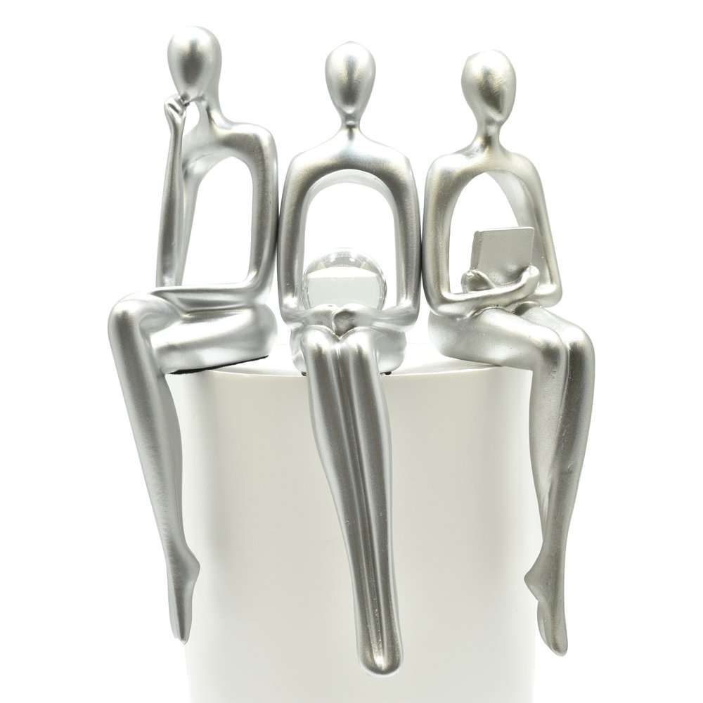 Set of Three Silver Resin People Tabletop Sculpture