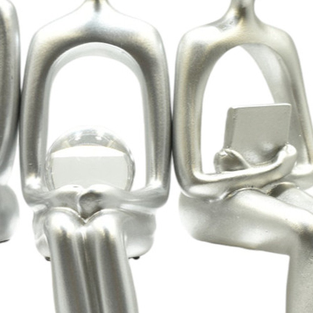 Set of Three Silver Resin People Tabletop Sculpture
