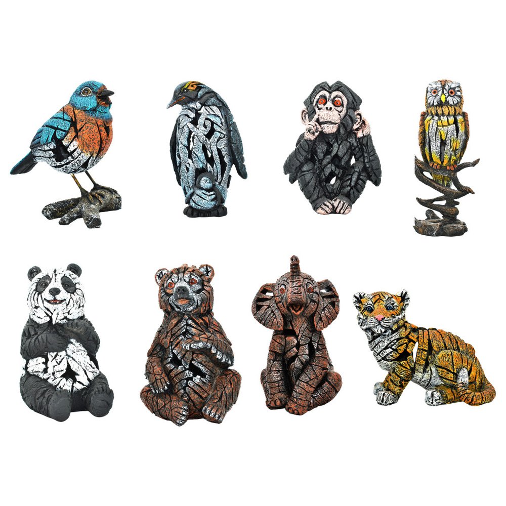 Set of Eight Brown White And Black Resin Wilderness Tabletop Sculpture