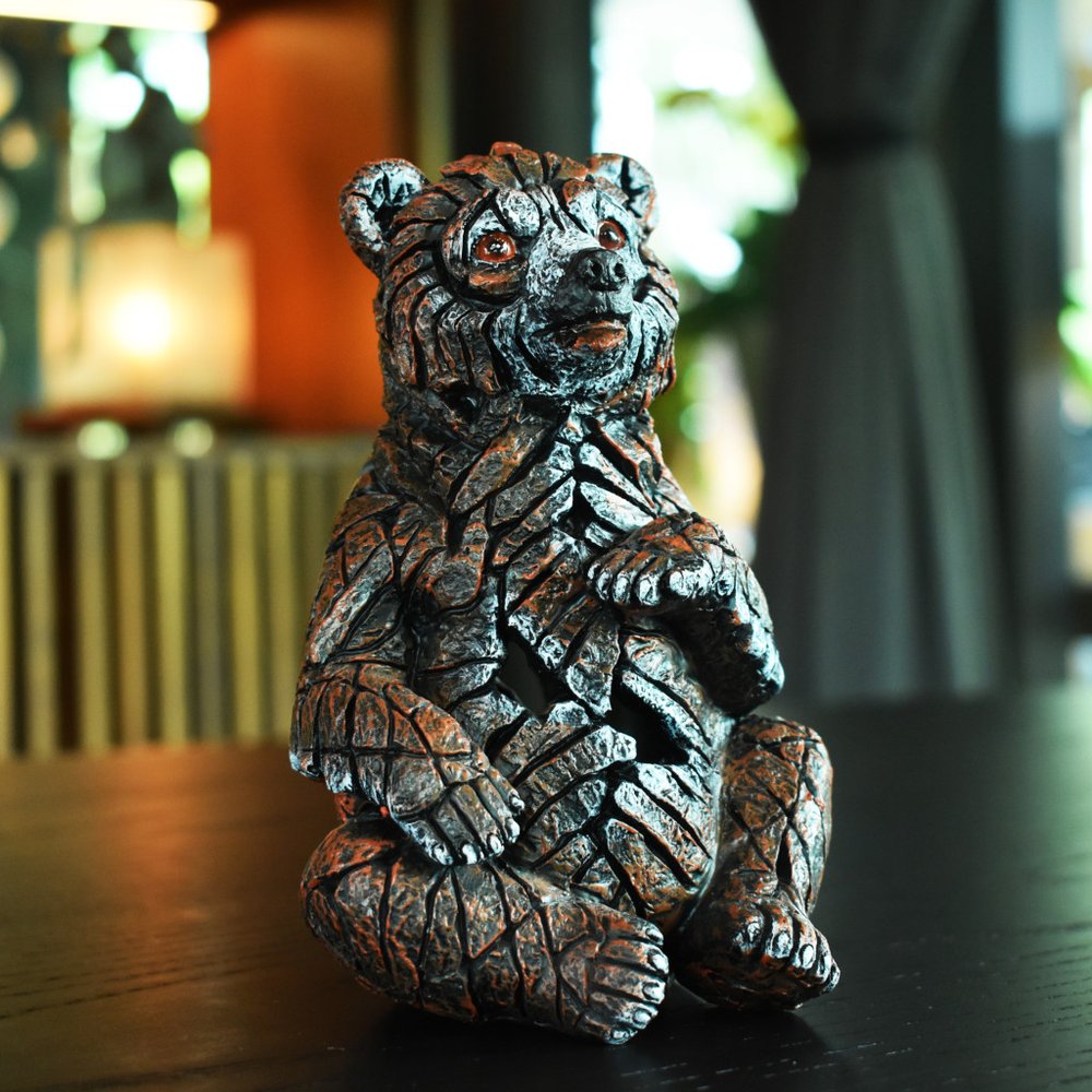 Set of Eight Brown White And Black Resin Wilderness Tabletop Sculpture