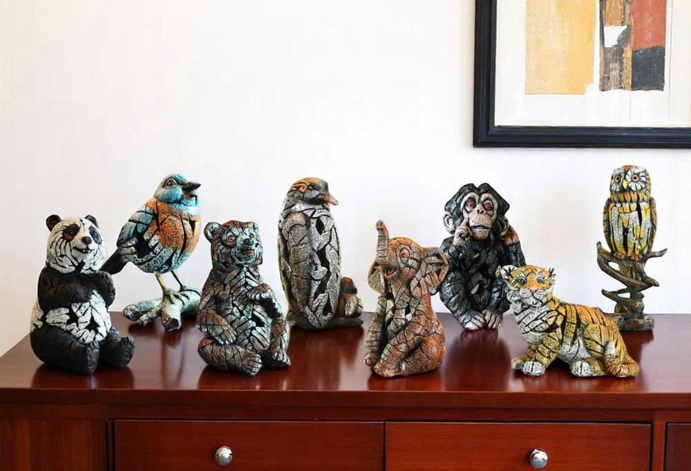 Set of Eight Brown White And Black Resin Wilderness Tabletop Sculpture