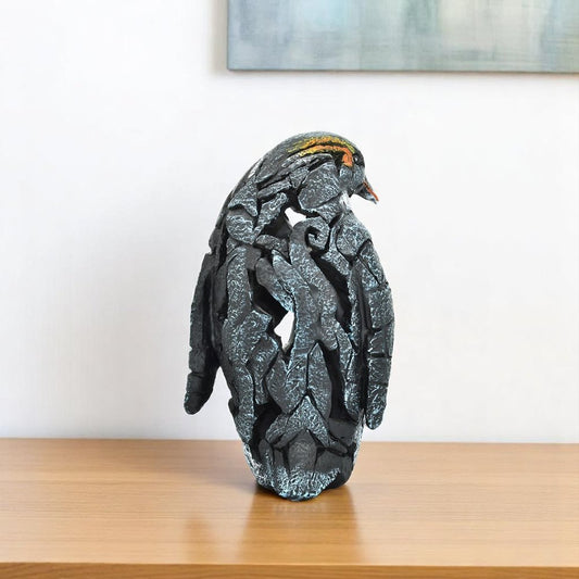 6" Black Blue And Orange Resin Penguin Tabletop Sculpture
