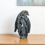 6" Black Blue And Orange Resin Penguin Tabletop Sculpture