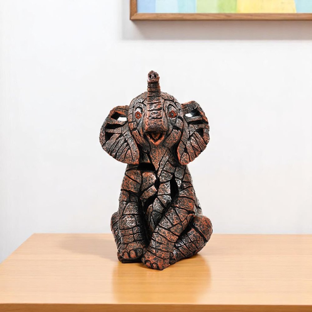 6" Brown And White Resin Elephant Tabletop Sculpture