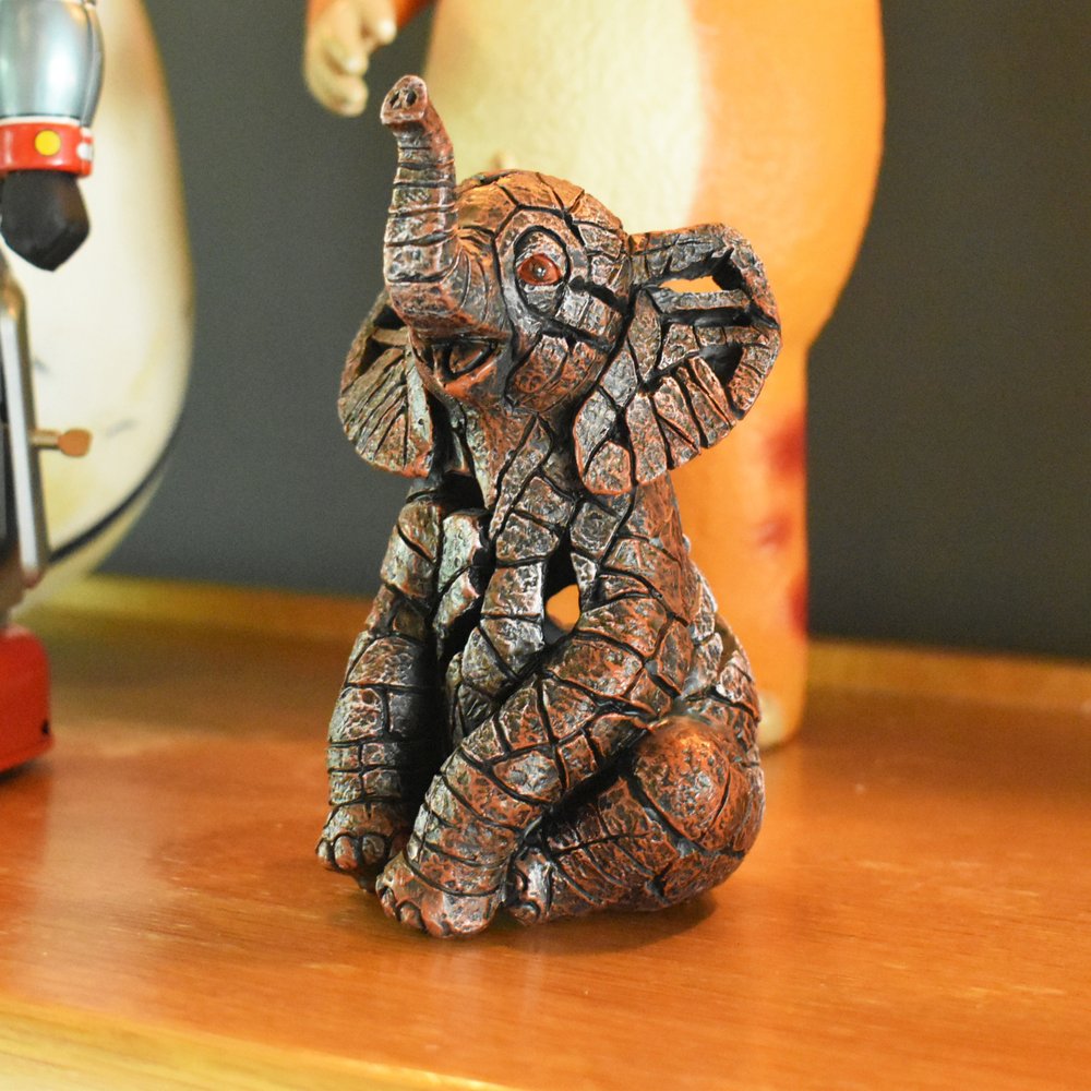 6" Brown And White Resin Elephant Tabletop Sculpture