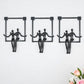 Set of Three Black Resin People Tabletop Sculpture