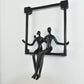 Set of Three Black Resin People Tabletop Sculpture