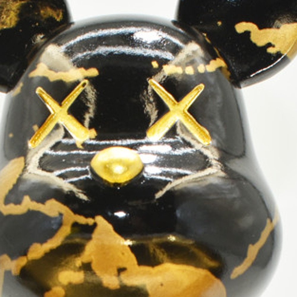 8" Black And Gold Resin Tabletop Sculpture