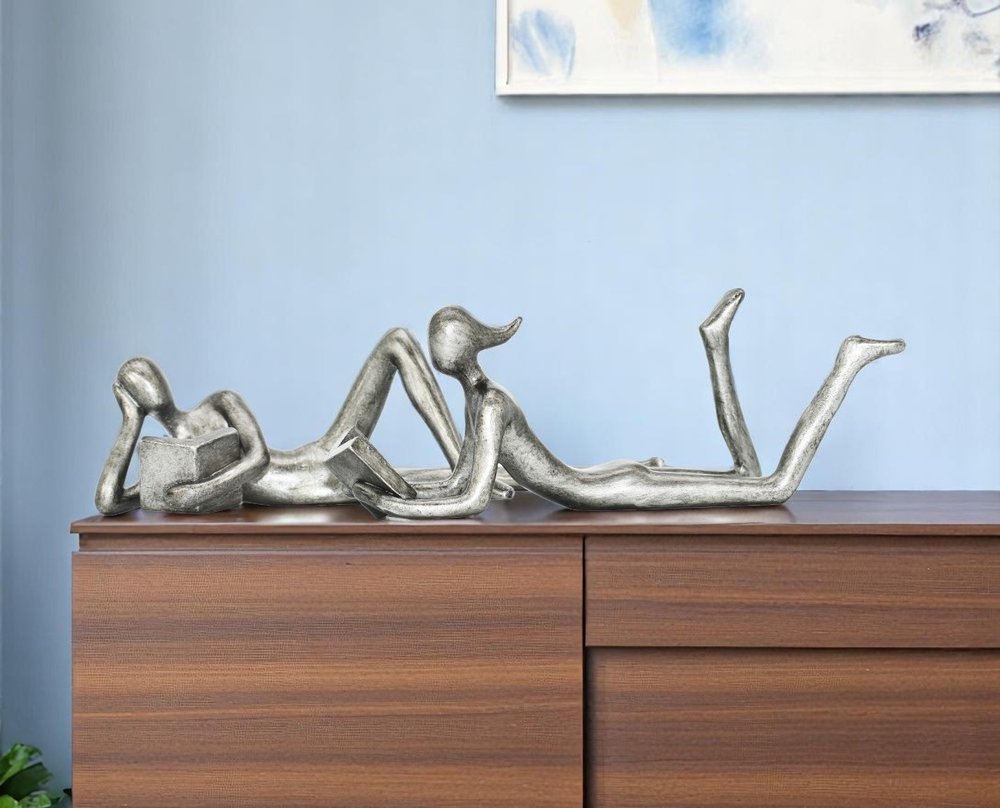 Set of Two Pewter Resin People Tabletop Sculpture