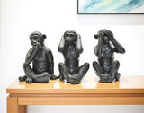 Set of Three Black Resin Monkey Tabletop Sculpture