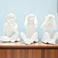 Set of Three White Resin Monkey Tabletop Sculpture