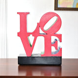 4" Red Blue And Green Resin Love Tabletop Sculpture