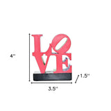 4" Red Blue Green And Black Resin Love Tabletop Sculpture