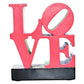 4" Red Blue Green And Black Resin Love Tabletop Sculpture