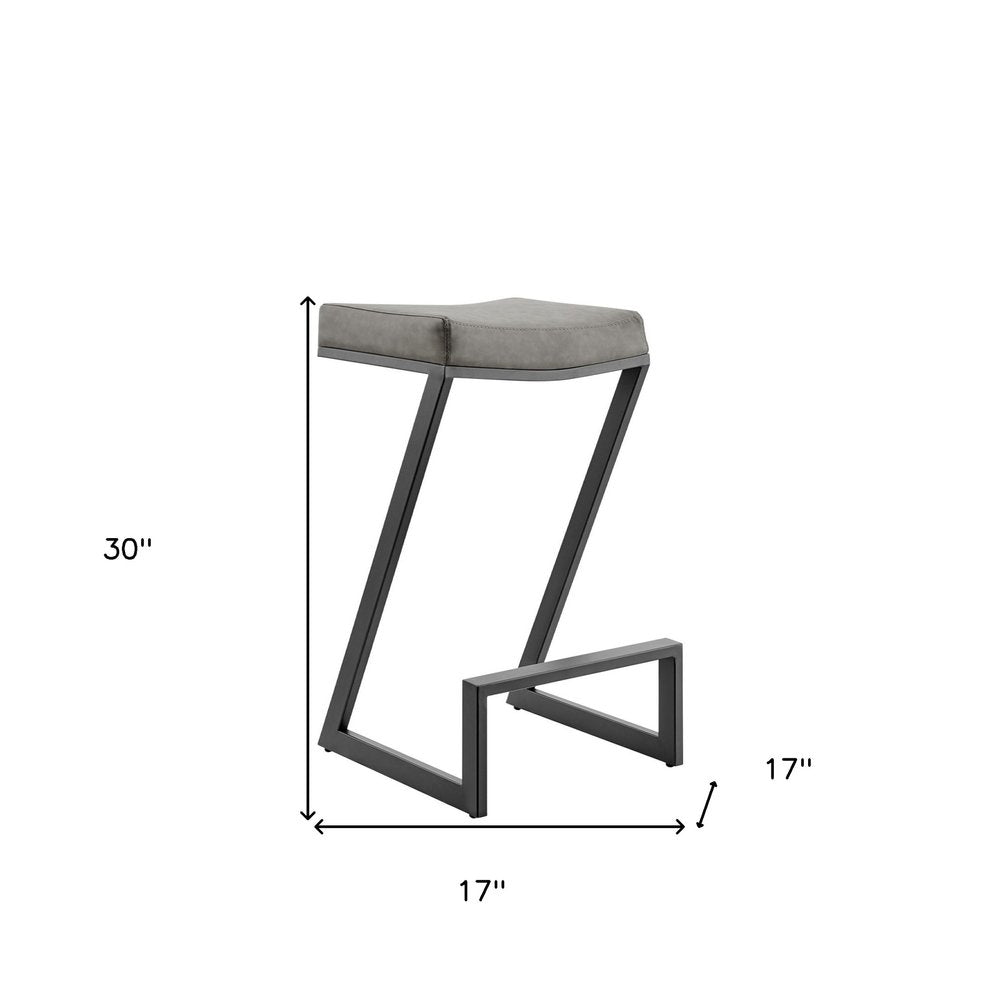 30" Gray And Black Faux Leather And Iron Backless Bar Height Bar Chair
