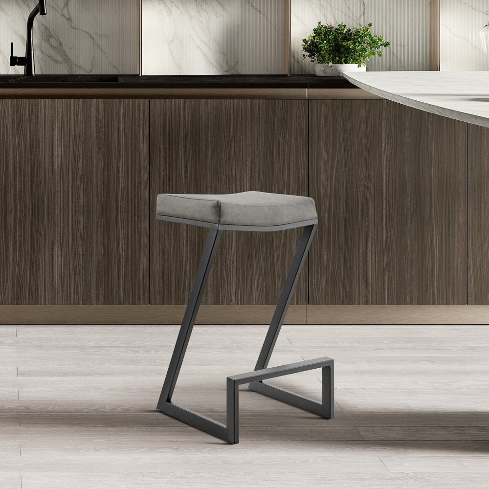 30" Gray And Black Faux Leather And Iron Backless Bar Height Bar Chair