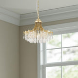 Clear And Gold Metal and Crystals Chandelier With Clear Shade
