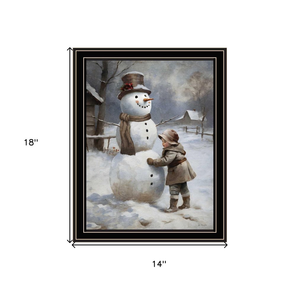 Boy Building A Snowman Black Framed Wall Art