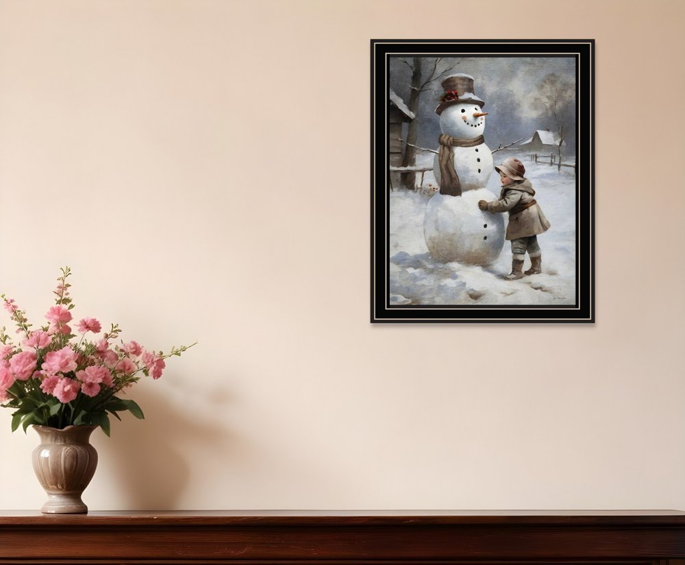 Boy Building A Snowman Black Framed Wall Art