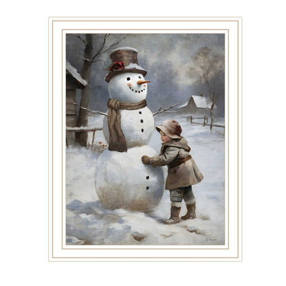Boy Building A Snowman White Framed Wall Art
