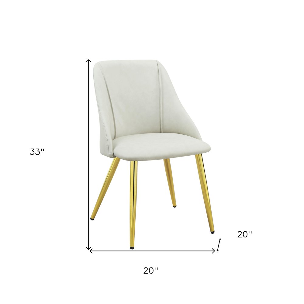 Set of Two White and Gold Upholstered Faux Leather And Metal Dining Side Chairs
