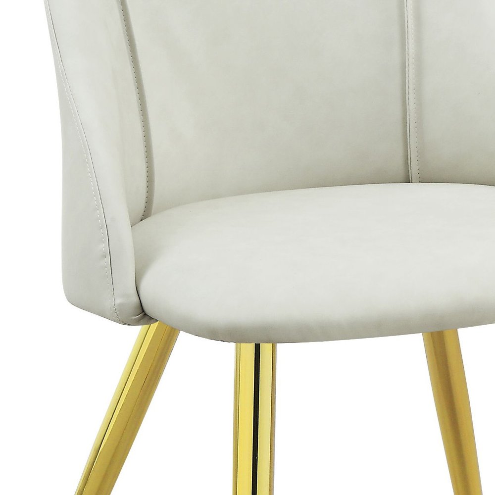 Set of Two White and Gold Upholstered Faux Leather And Metal Dining Side Chairs