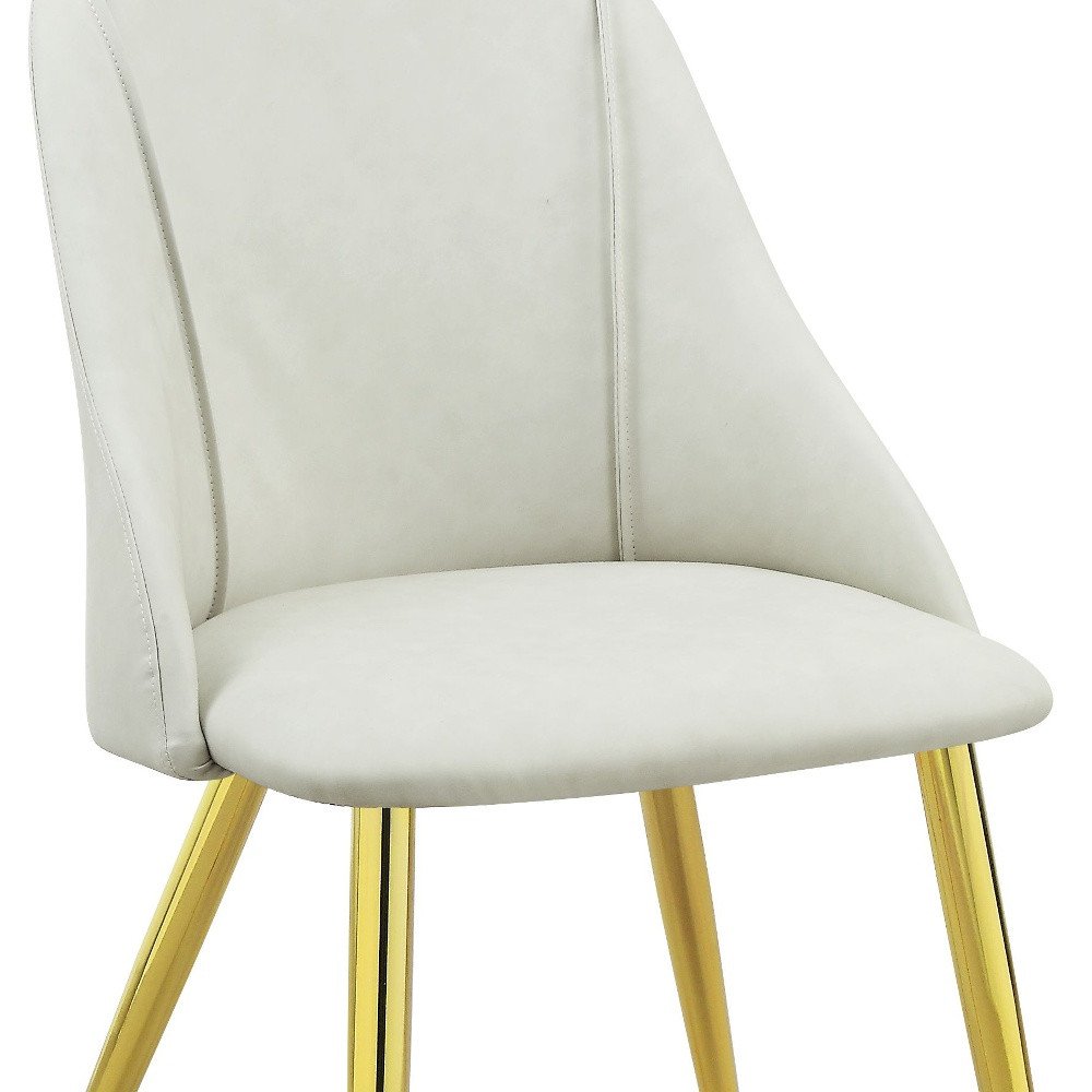 Set of Two White and Gold Upholstered Faux Leather And Metal Dining Side Chairs