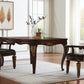 Set of Two Tufted Brown and Redwood Upholstered Faux Leather And Solid Wood Dining Arm Chairs