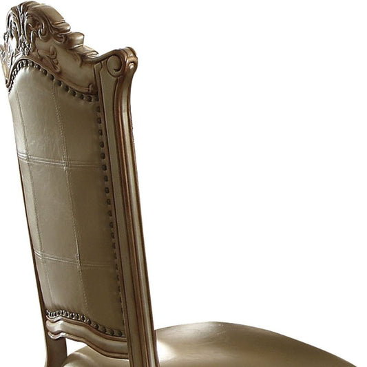 Set of Two Tufted Bone and Brass Upholstered Faux Leather And Wood Dining Side Chairs
