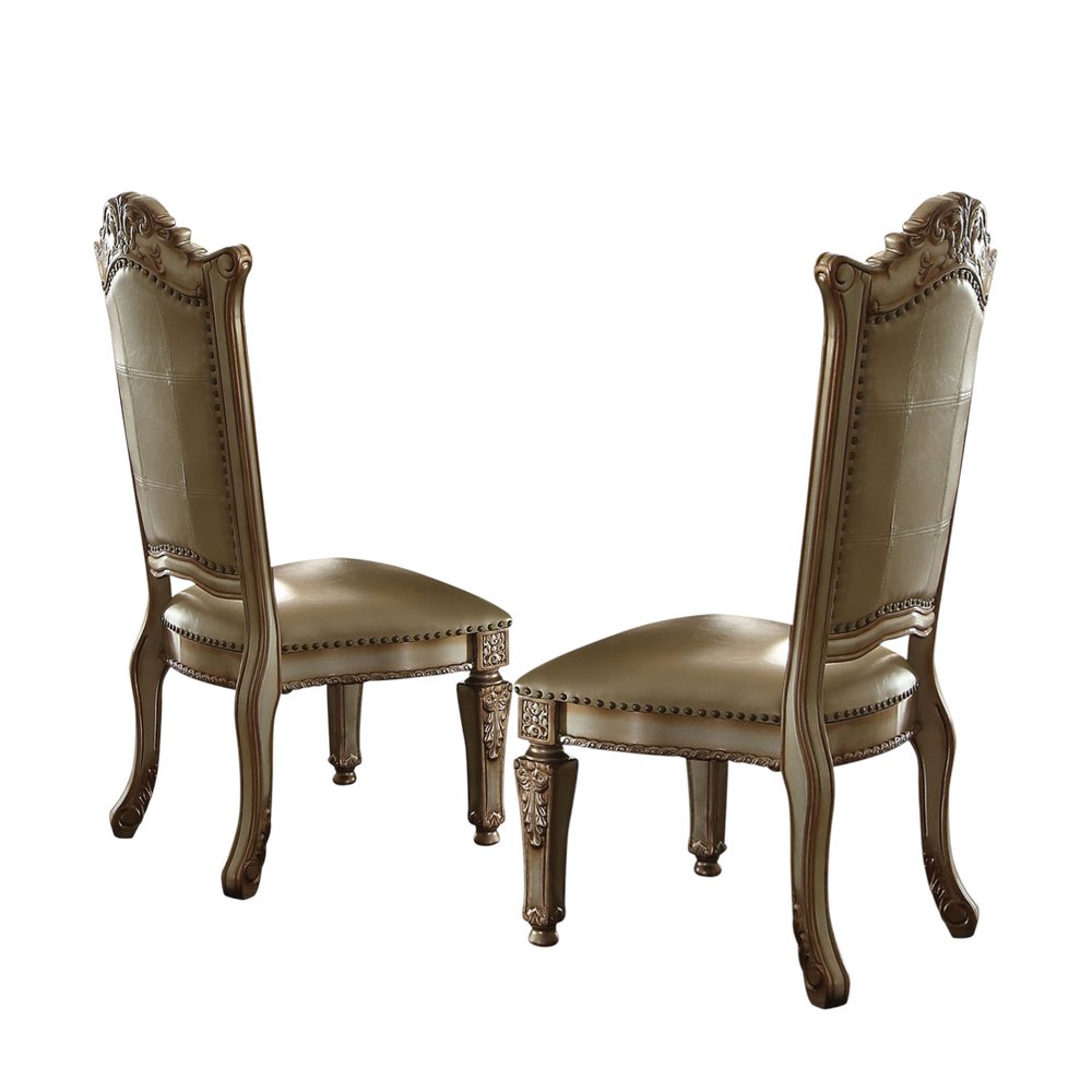 Set of Two Tufted Bone and Brass Upholstered Faux Leather And Wood Dining Side Chairs