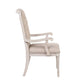 Set of Two Tufted Antiqued White and Champagne Upholstered Fabric And Solid Wood Dining Arm Chairs