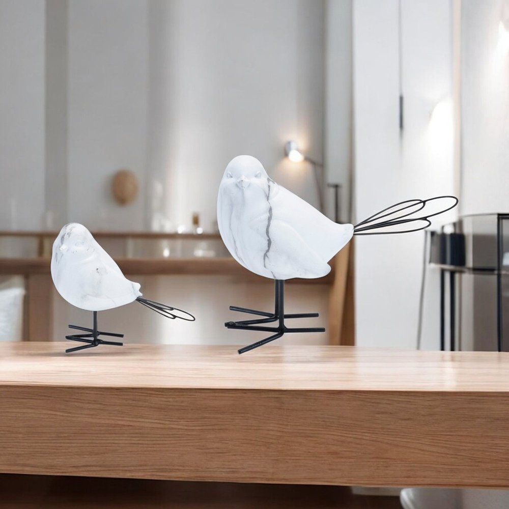 Set of Four White Polyresin Figurine Tabletop Sculpture