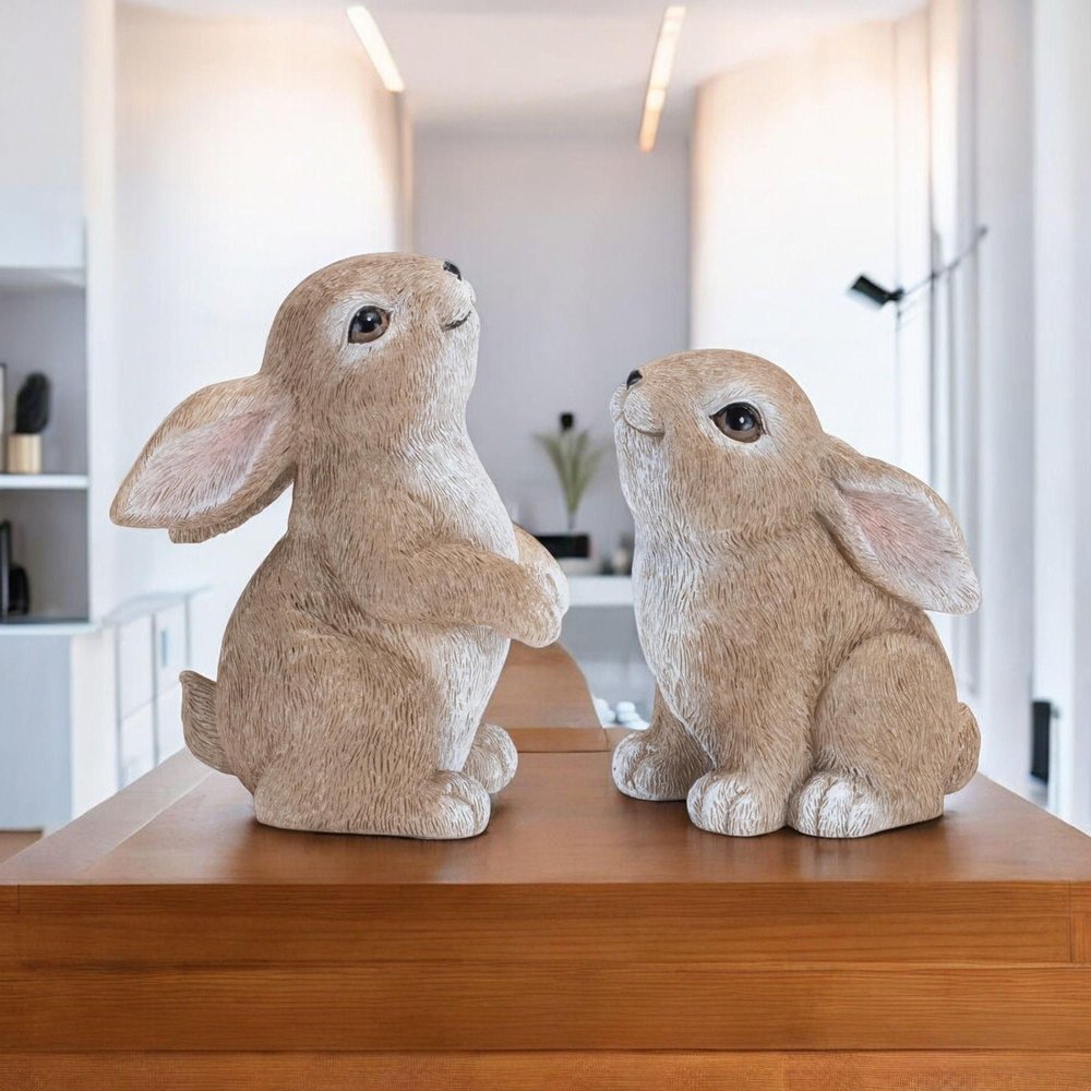 Set of Four Beige Polyresin Figurine Tabletop Sculpture