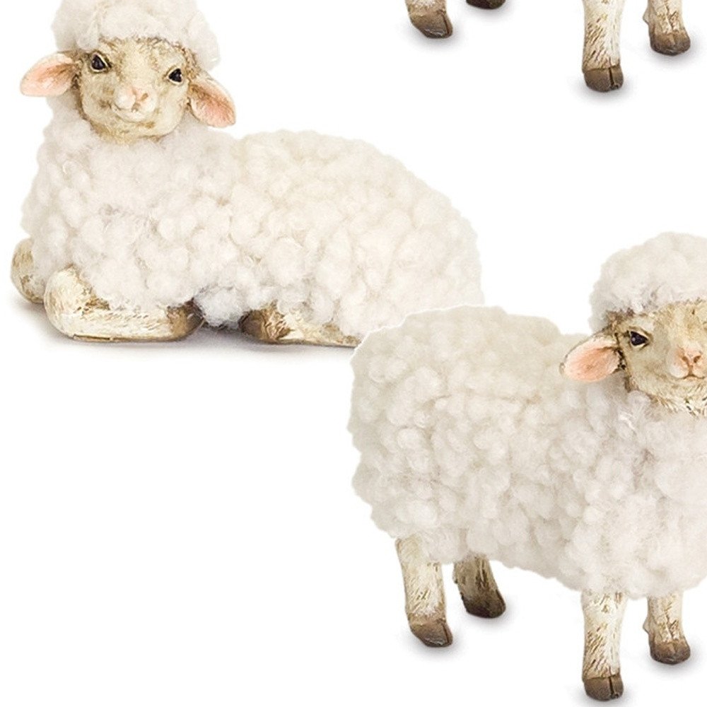 Set of Eight White Polyresin Tabletop Sculpture