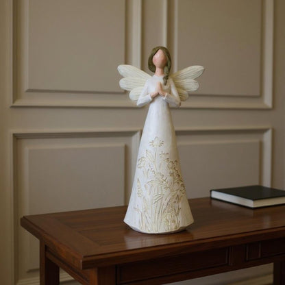 Set of Three White Polyresin Figurine Tabletop Sculpture