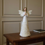 Set of Three White Polyresin Figurine Tabletop Sculpture