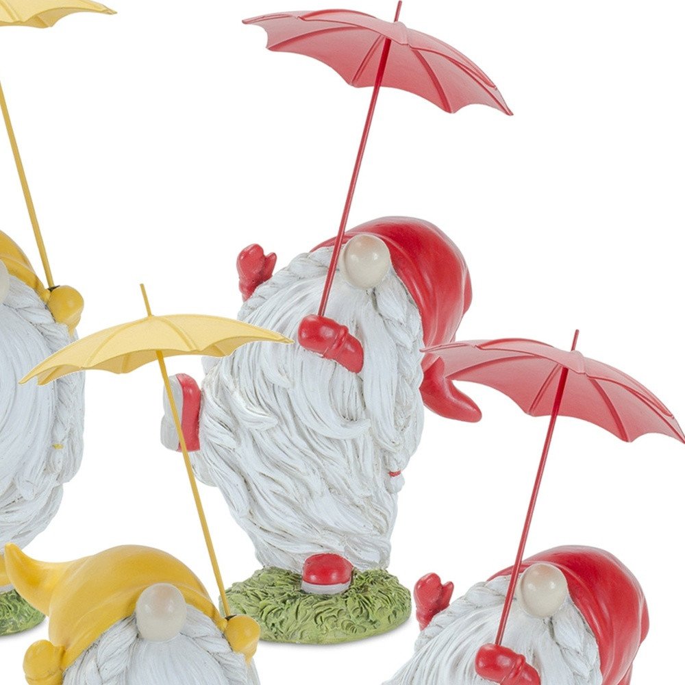 Set of Four Yellow Polyresin Standing Gnome Tabletop Sculpture