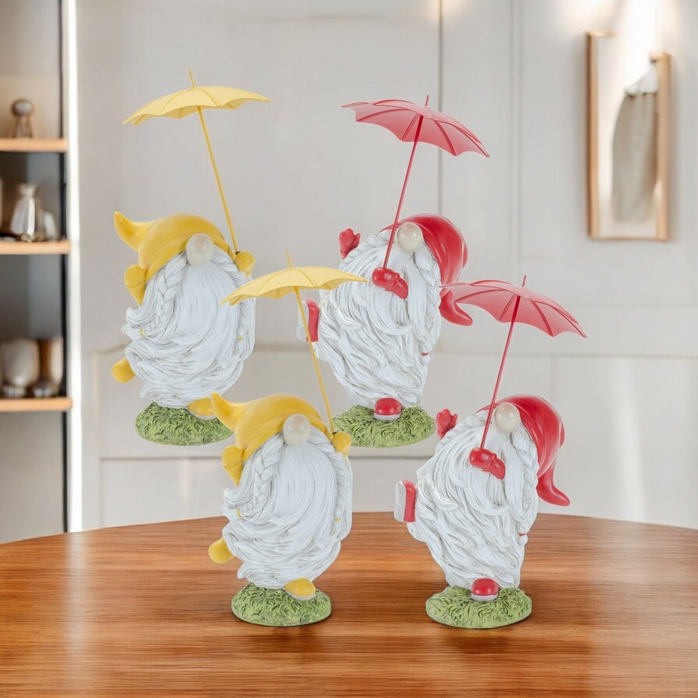 Set of Four Yellow Polyresin Standing Gnome Tabletop Sculpture