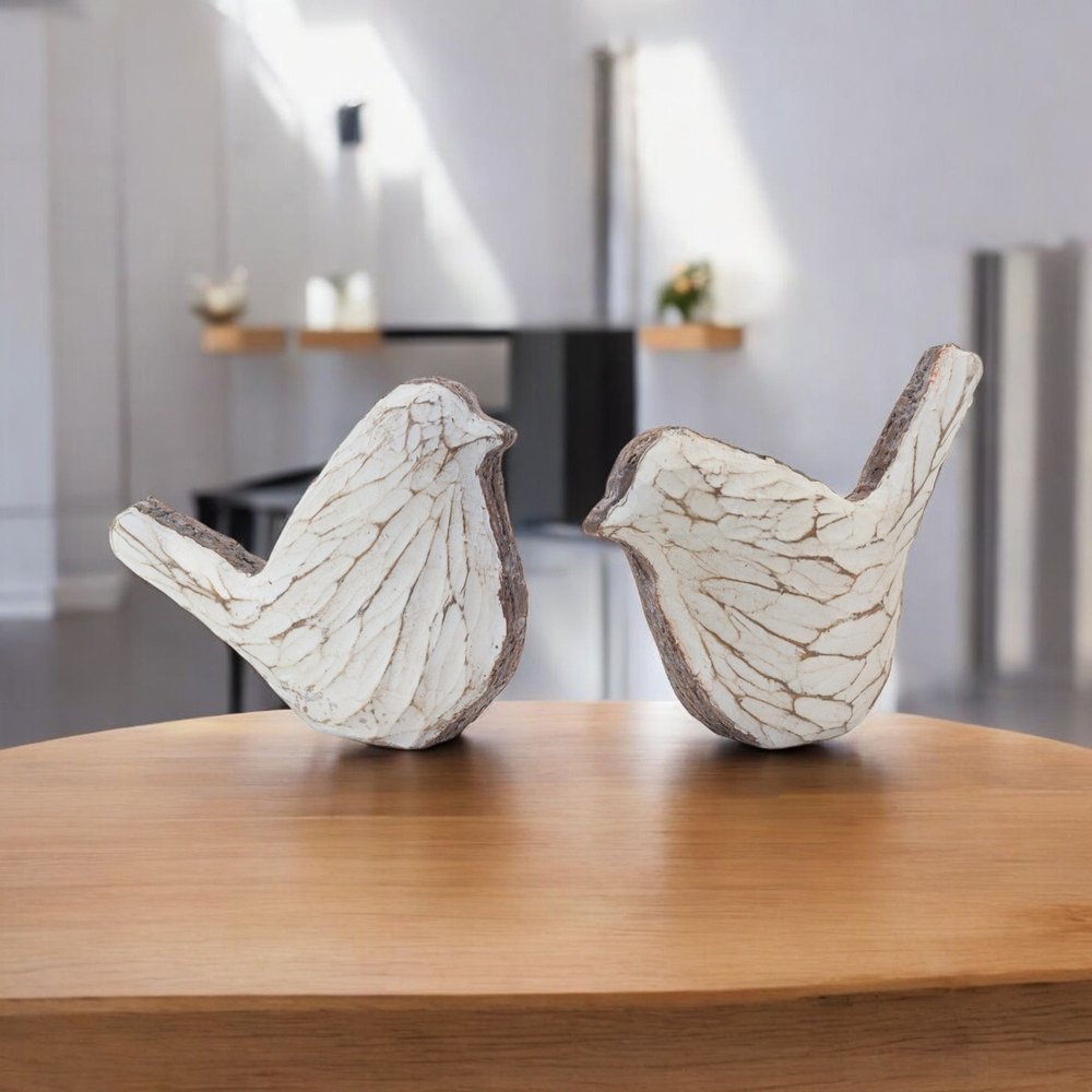 Set of Four Brown Resin Figurine Tabletop Sculpture