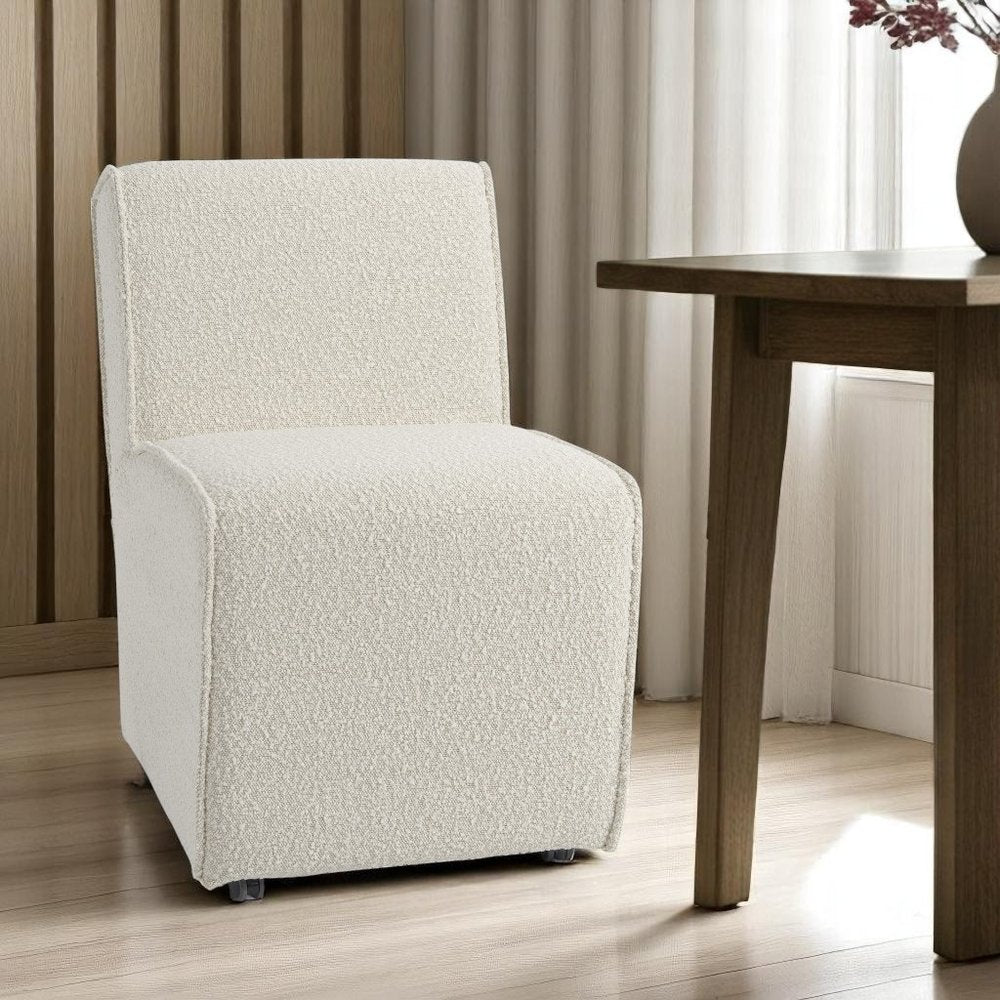 Cream Fully Upholstered Boucle Dining Side Chair With Wheels