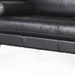 88" Black Leather Sofa And Toss Pillows With Brown Legs