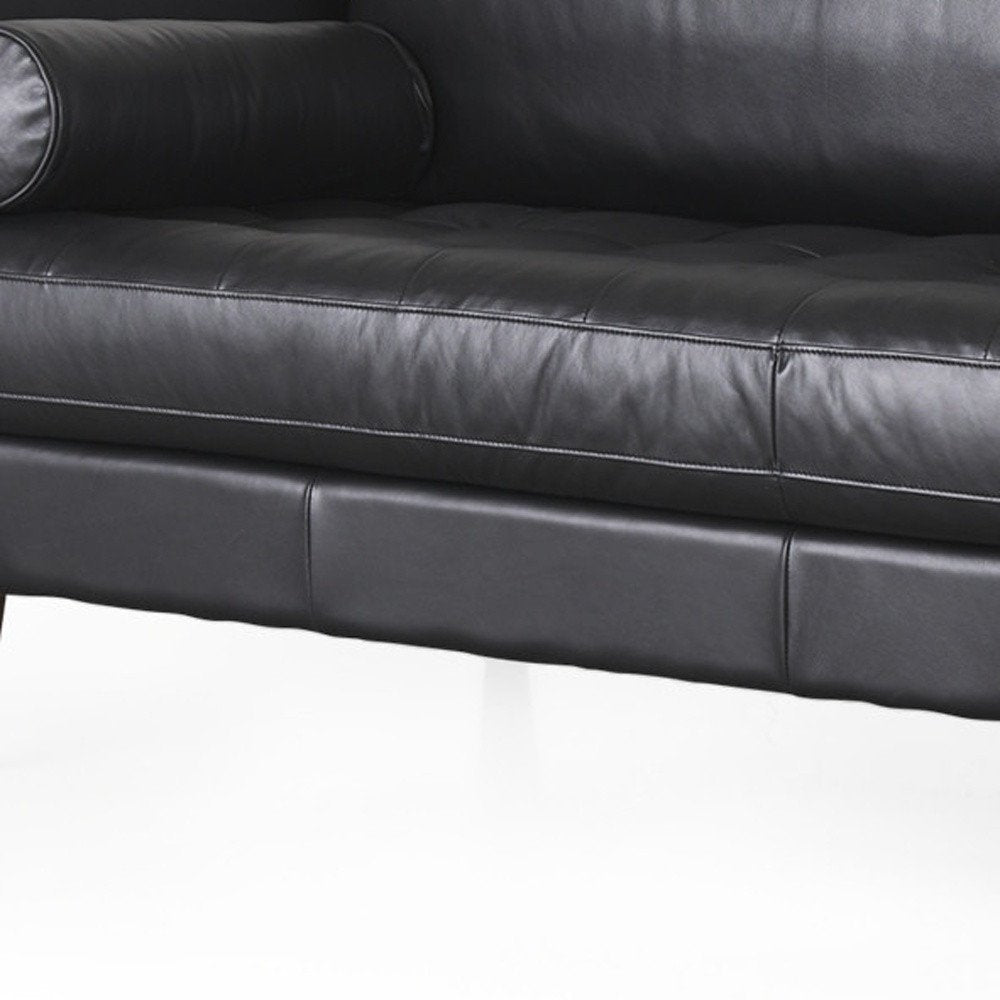 88" Black Leather Sofa And Toss Pillows With Brown Legs